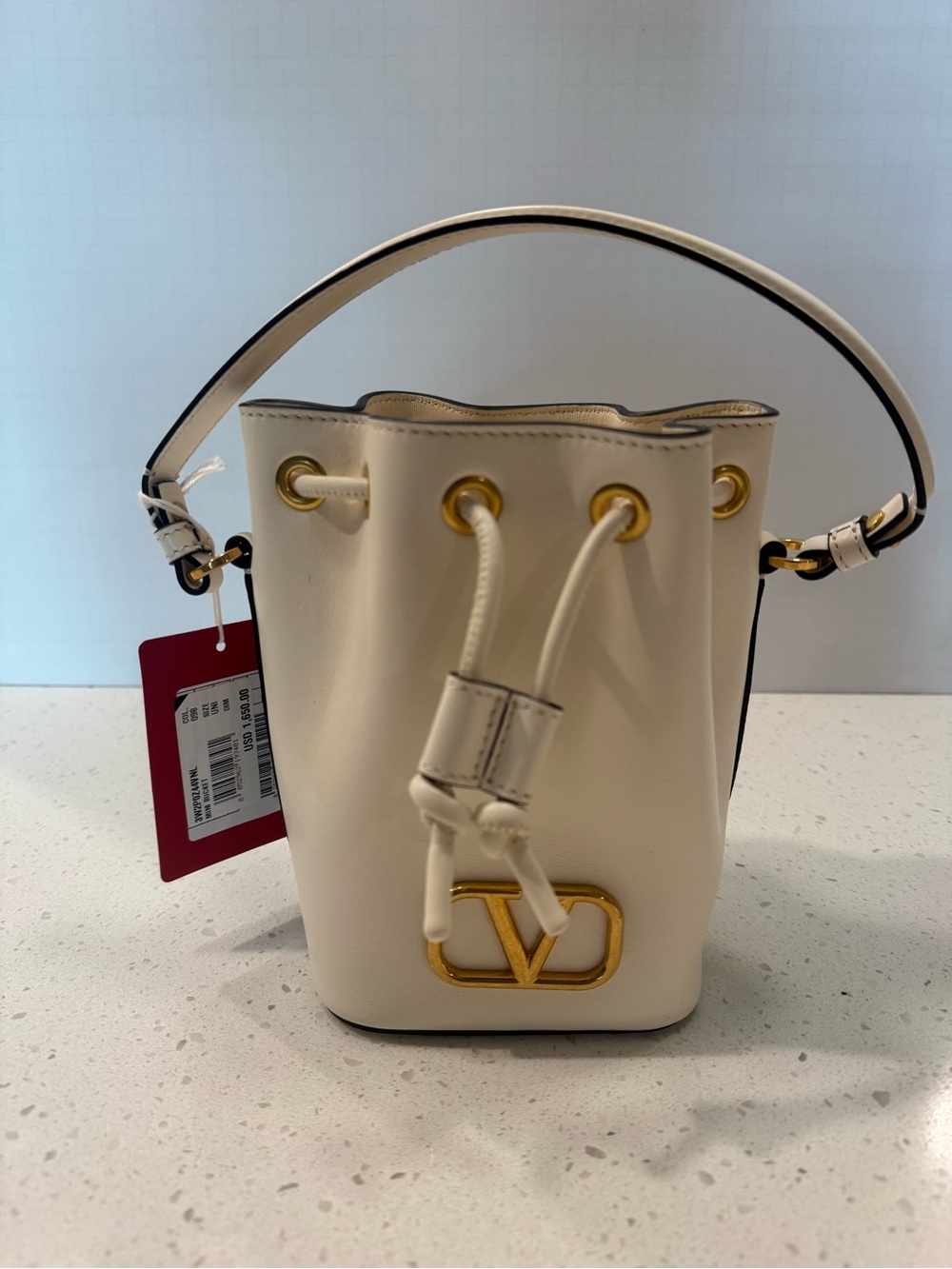 NWT & BOX Valentino Garavani Cream Leather VLogo Mini Drawstring Bag - Picture 4 of 15